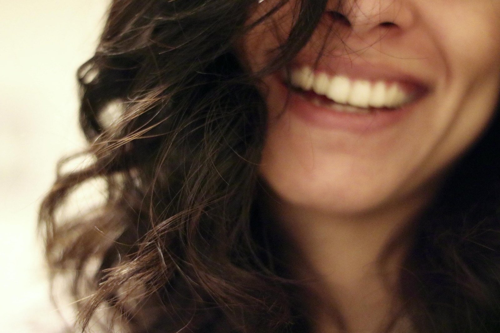 A smiling woman looking relieved